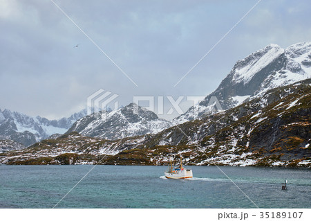 Fishing ship in fjord in Norway Fishing ship in fjord in Norway 35189107