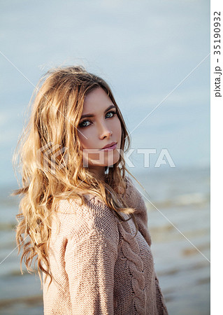 Beautiful Model with Makeup and Curly Hairstyle 35190932