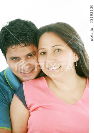handsome man hugging his wife from behind against 35193136