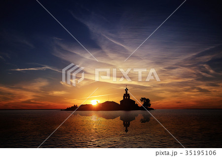 Summer sunset on the lake church 35195106