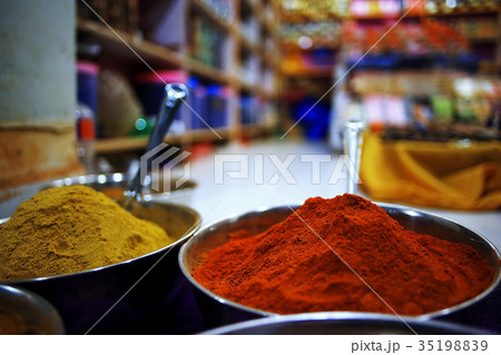 Various Indian condiments in bowls 35198839