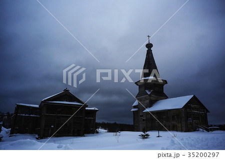 Wooden churches and houses in winter 35200297