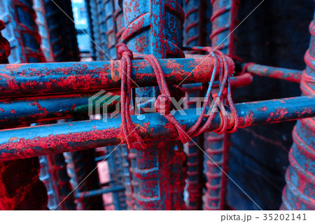 The iron looks stable and rusty with scarlet scars 35202141