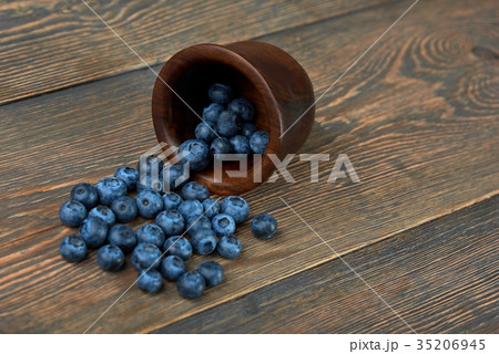 Blueberries on wooden background 35206945