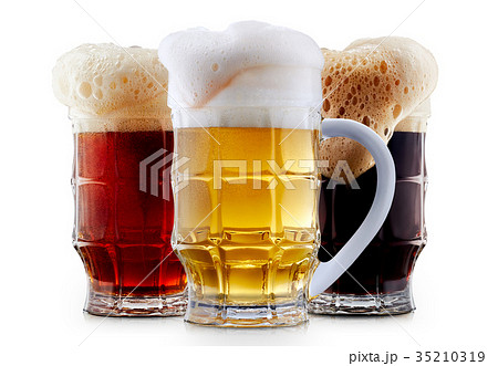 Mug collection of frosty beer with foam 35210319