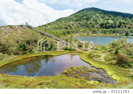 草津白根山 逢ノ峰と弓池の写真素材