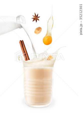 eggnog with splash isolated on white 35212301