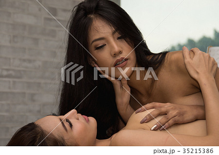 Portrait of young woman brunette with beautiful nude topless bre 35215386