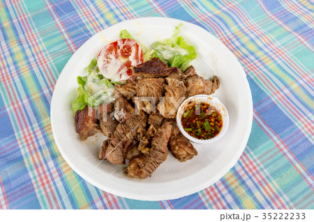 Grilled steak meat with vegetable salad 35222233