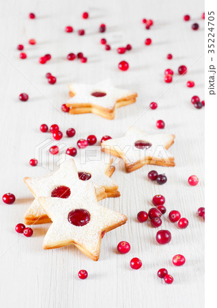 Traditional Linzer cookies - stars with red jam 35224705