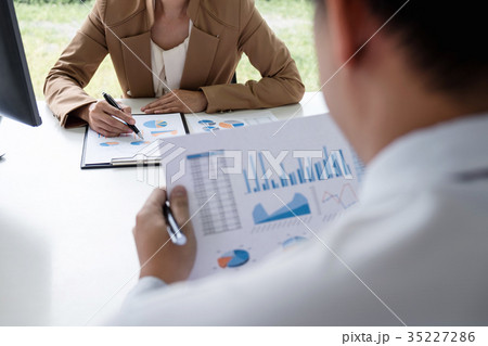 Business people conference, Two confident executive colleagues m Business people conference, Two confident executive colleagues m 35227286