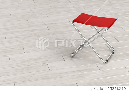 Folding stool on wooden floor 35228240