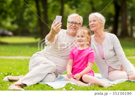 senior grandparents and granddaughter selfie senior grandparents and granddaughter selfie 35230190