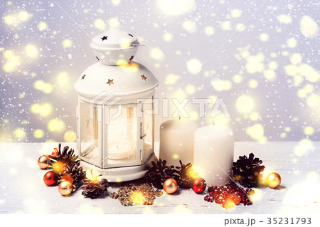 Burning Candle Lantern and Christmas composition  35231793