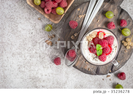Summer healthy dessert with raspberries and yogurt Summer healthy dessert with raspberries and yogurt 35236278