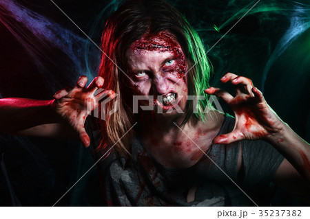 Close-up portrait of horrible zombie woman with 35237382