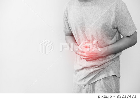 a man touching his stomach, stomach pain concept 35237473