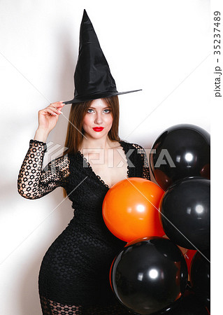 Portrait of beautiful young woman in black witch 35237489
