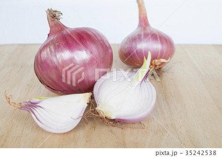 Closeup of Shallots on white background Closeup of Shallots on white background 35242538