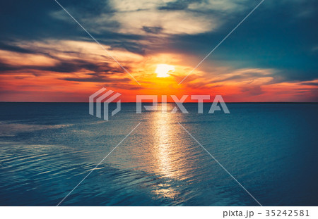 Colorful and Dramatic Sunset Sky Ocean Background 35242581