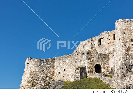 Walls of Spis Castle against blue sky in Slovakia. Walls of Spis Castle against blue sky in Slovakia. 35243220