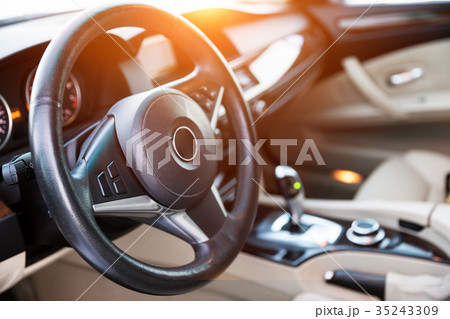 Interior view of car with luxery beige salon Interior view of car with luxery beige salon 35243309