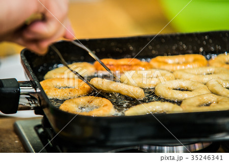 The chef in the kitchen prepares food with The chef in the kitchen prepares food with 35246341
