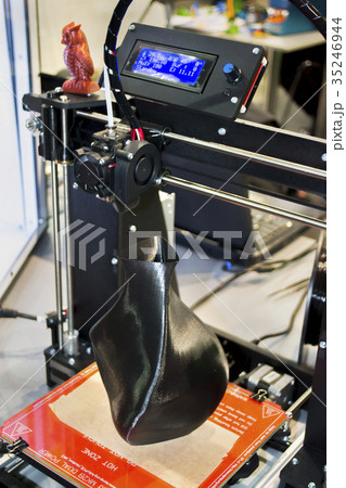 3D printer printing a model in the form of black 35246944