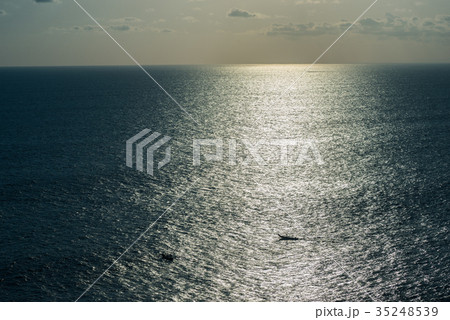 the boat sails at sunset in the ocean the boat sails at sunset in the ocean 35248539