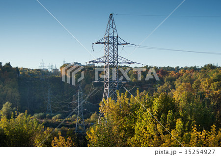high voltage post at autumn forest 35254927