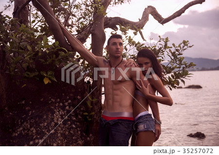 Outdoor pretty beautiful young romantic couple Outdoor pretty beautiful young romantic couple 35257072