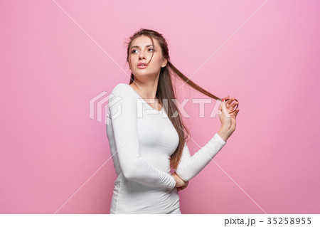 The young woman's portrait with thoughtful The young woman's portrait with thoughtful 35258955
