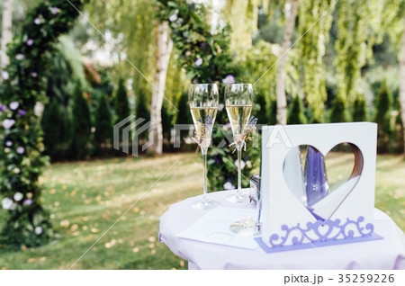 Beautiful wedding glass with champagne Beautiful wedding glass with champagne 35259226