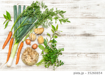 Fresh organic vegetables wooden background  35260854