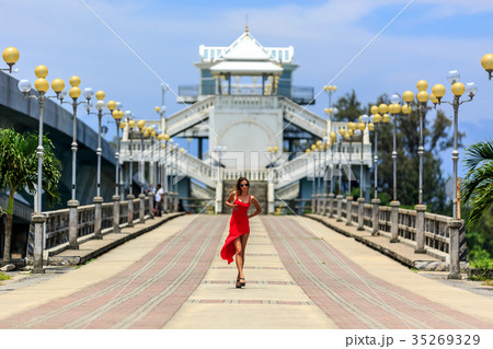 Young Woman Walking on The Sarasin Bridge 35269329