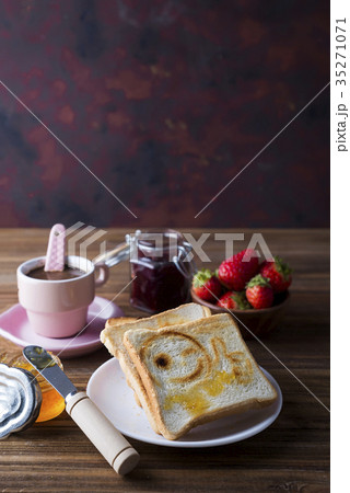 Fresh and bright continental breakfast table  Fresh and bright continental breakfast table  35271071