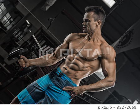 Handsome man with big muscles, posing  35272669