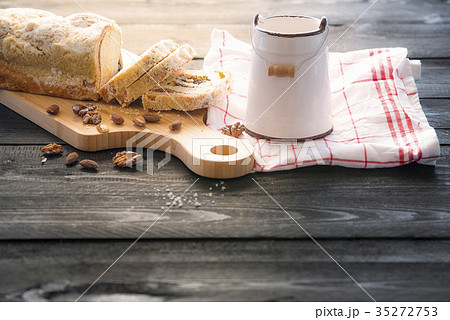 Sliced pound cake on wooden table 35272753
