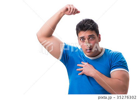Man sweating excessively smelling bad isolated on Man sweating excessively smelling bad isolated on 35276302