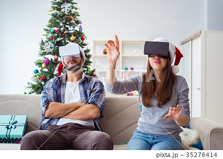 Happy family using virtual reality VR glasses 35276414