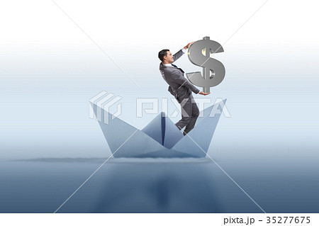 Businessman holding dollar riding paper ship boat 35277675