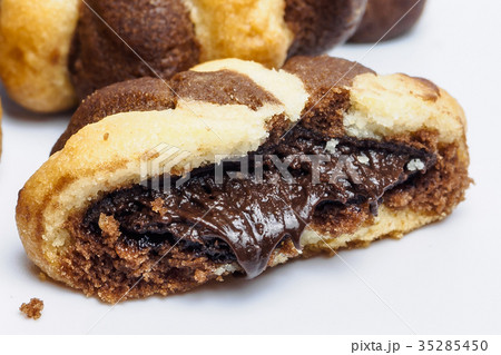 Closeup of chocolate cream filled biscuits Closeup of chocolate cream filled biscuits 35285450