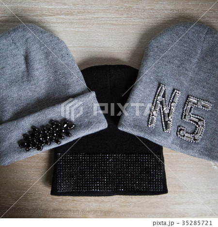 woolen light blue scarf, gloves and hat over white 35285721