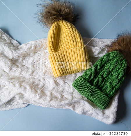 woolen light blue scarf, gloves and hat over white woolen light blue scarf, gloves and hat over white 35285750