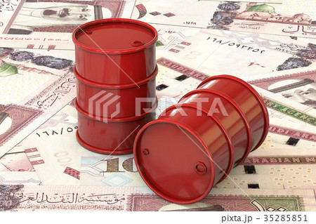 Red barrels of oil lie on background of banknote one hundred riyals, Saudi Arabia 35285851