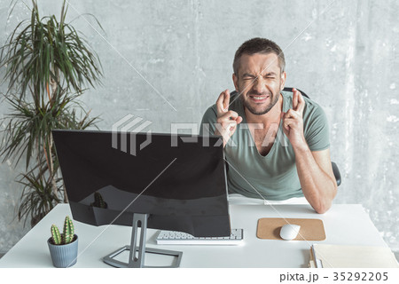 Pleasant young man is hoping that things will 35292205