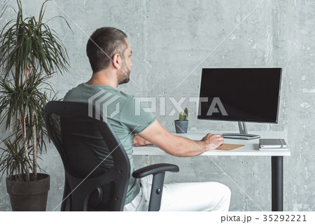 Pleasant professional employee is sitting at 35292221