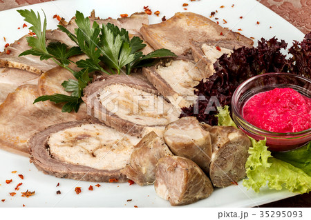 Cold appetizer of meat products with horseradish 35295093