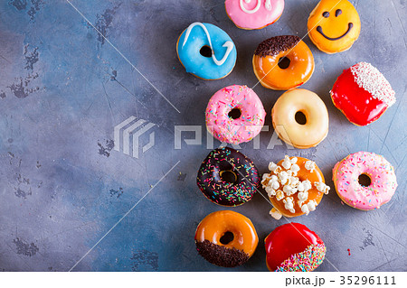 sweet doughnuts on gray stone background sweet doughnuts on gray stone background 35296111