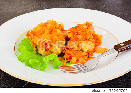 Fish in Greek with Onion and Carrot 35296702